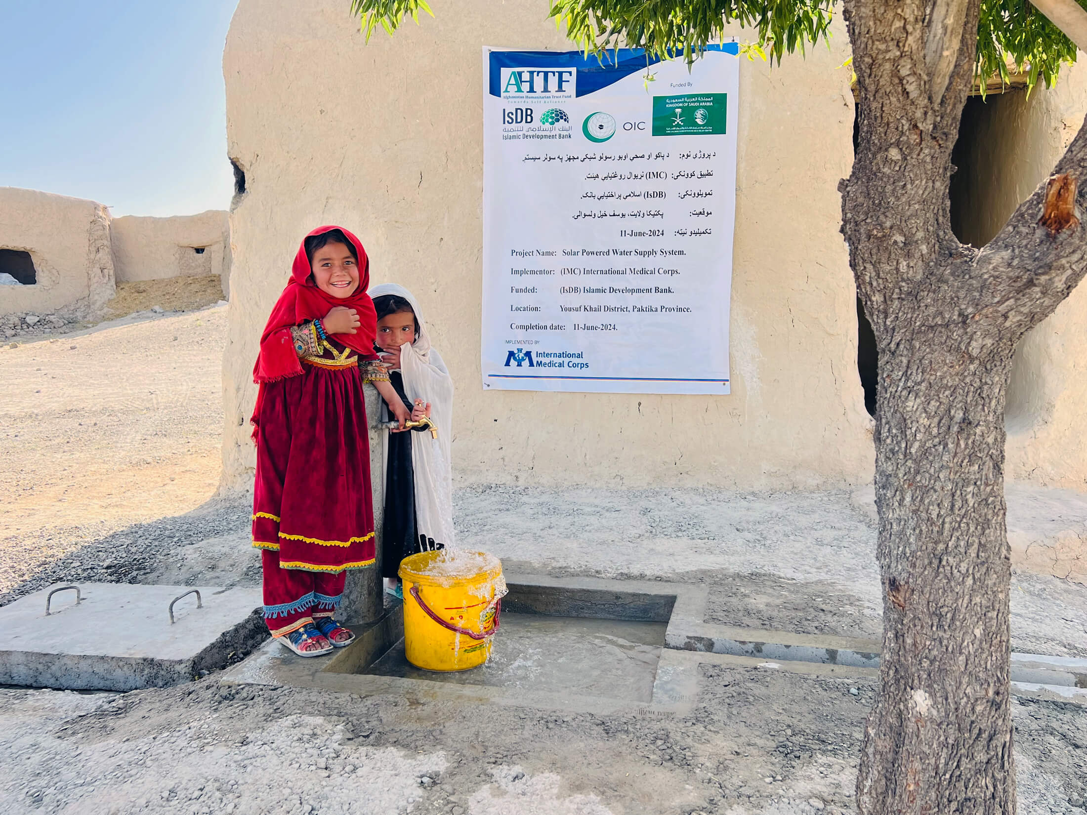 AFGH_Picture---11 Families collect water from a water tab built by our teams.
