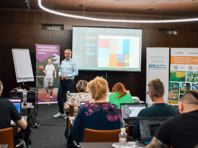 Ukrainians who were wounded by the war attend a data analysis skills session at the Superhumans Center to help them reskill and find new careers.