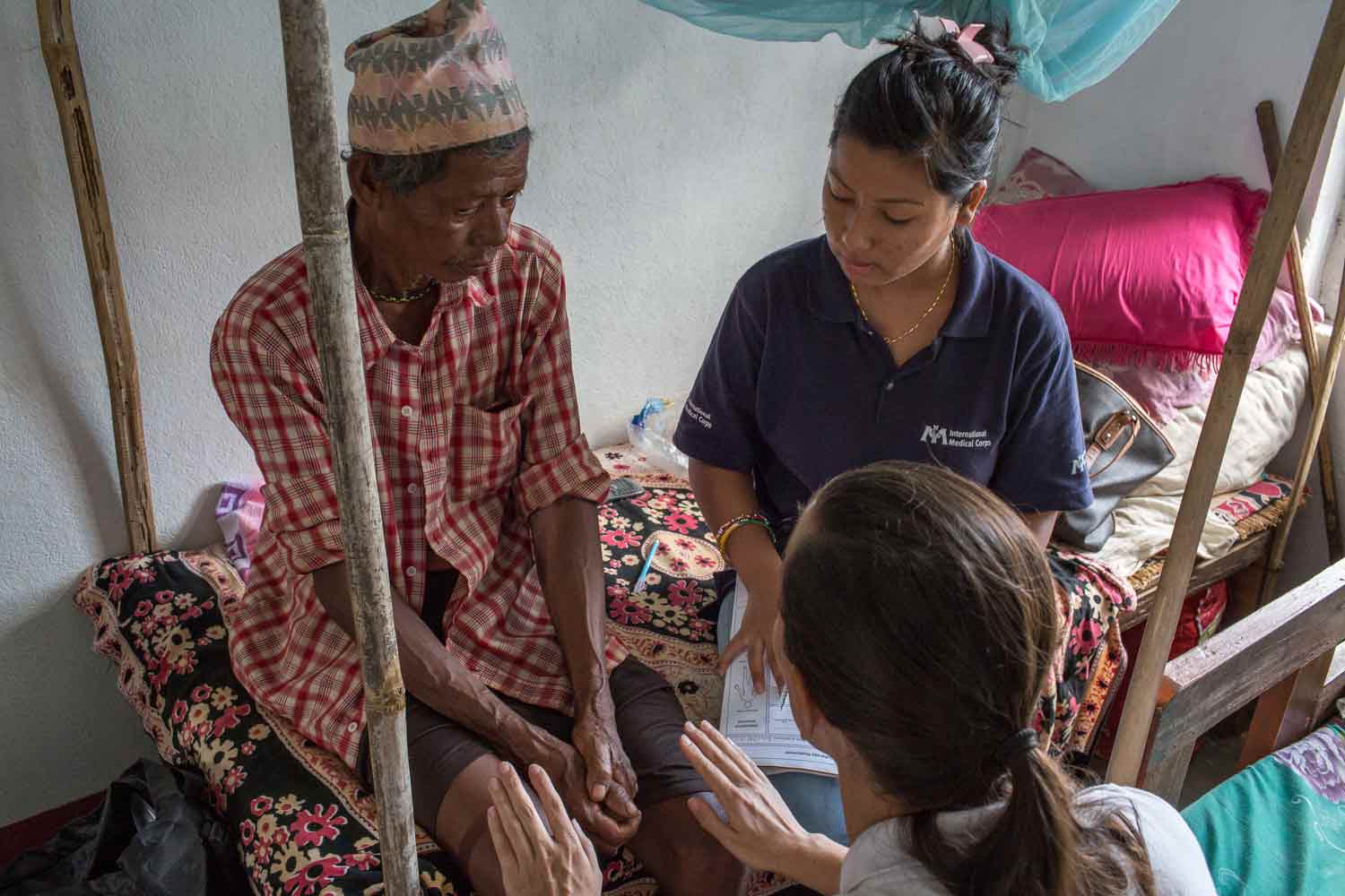 DHUWAKOT-NEPAL---July-17-2015-A-physiotherapist-team-from-a-IMC-Mobile-Unit-perform-medical-checks-on-a-patient-during-a-field-visit_WEB DHUWAKOT-NEPAL---July-17-2015-A-physiotherapist-team-from-a-IMC-Mobile-Unit-perform-medical-checks-on-a-patient-during-a-field-visit_WEB