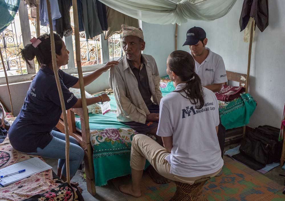DHUWAKOT-NEPAL---July-17-2015-A-physiotherapist-team-from-an-IMC-Mobile-Unit-perform-medical-checks-on-a-patient-during-a-field-visit-4_WEB DHUWAKOT-NEPAL---July-17-2015-A-physiotherapist-team-from-an-IMC-Mobile-Unit-perform-medical-checks-on-a-patient-during-a-field-visit-4_WEB