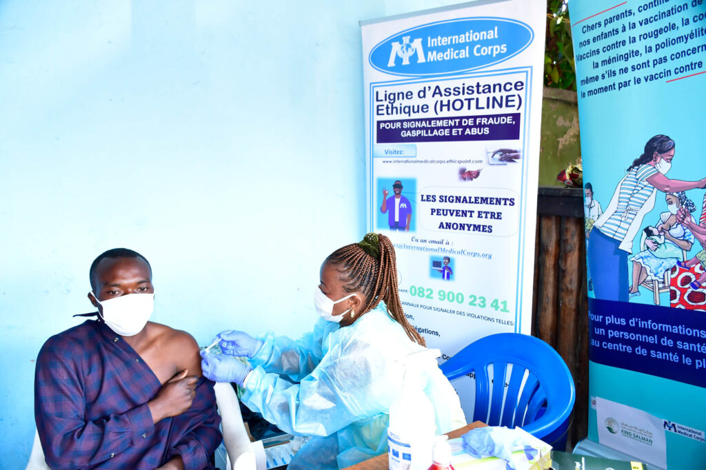 A motorcycle taxi driver during his vaccination against COVID-19.