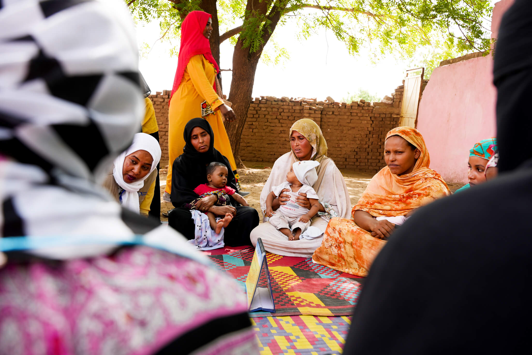 DSC05146 Marwa Malik begins each mother-to-mother support group meeting by recapping key points from the last session, to ensure everyone has the same level of knowledge.