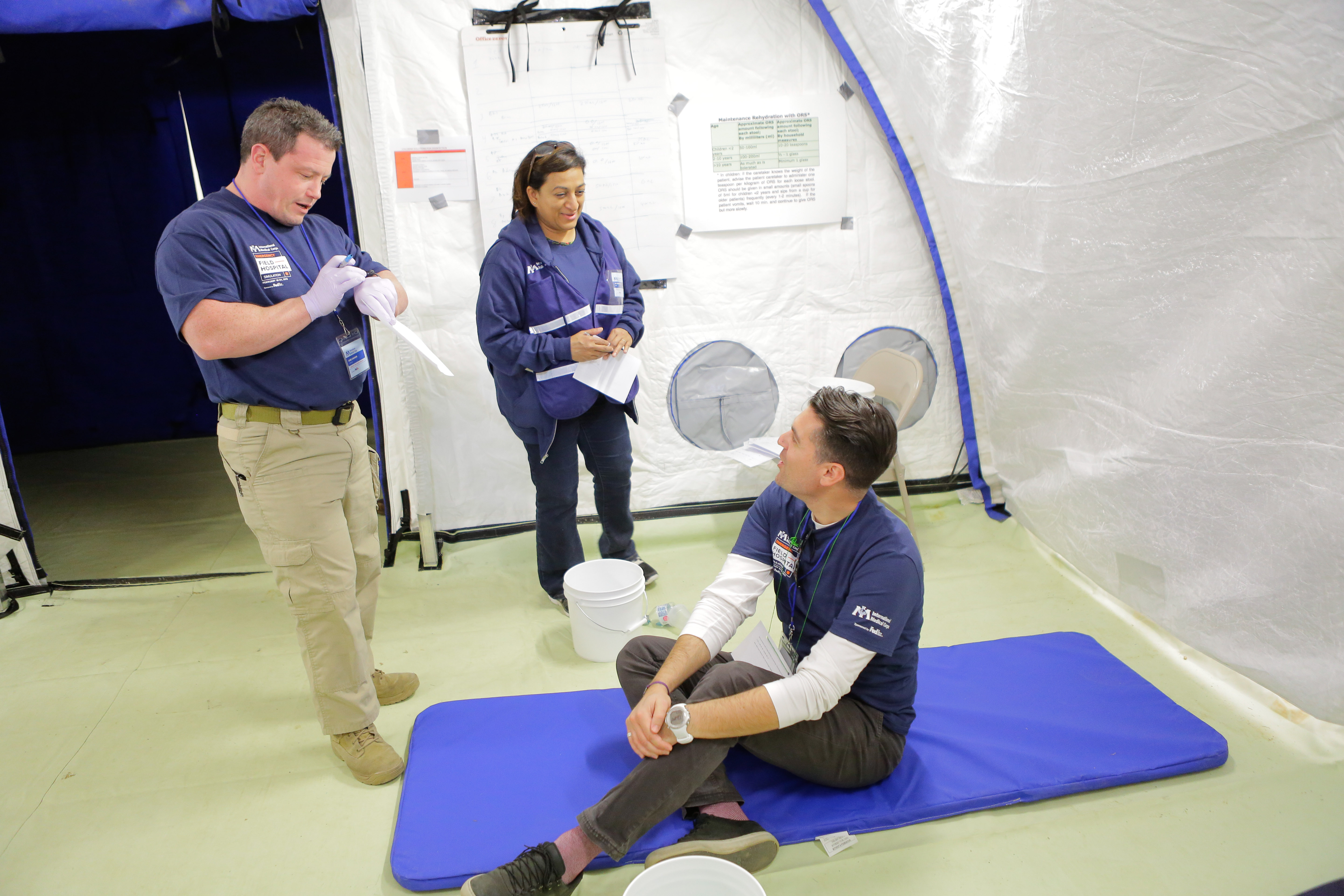 Simulation participants inside the field hospital Simulation participants inside the field hospital