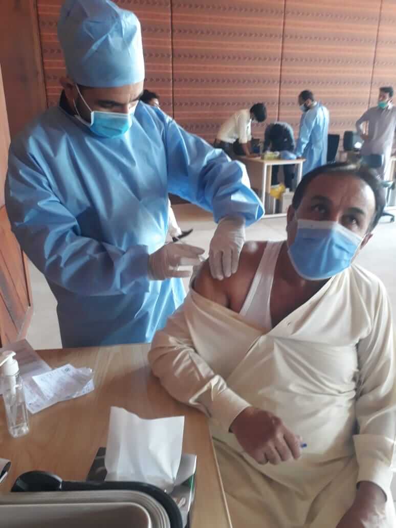 Irfan Khan, Office Assistant In Pakistan, our team is leading by example, with team members getting their COVID-19 vaccinations.