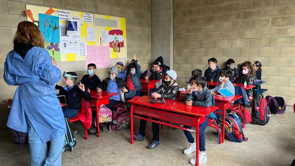 MADAD II_HOV Sanaa Ahmad giving an awareness session about Covid-19 to students at Culture school in Deir koucheh, BML