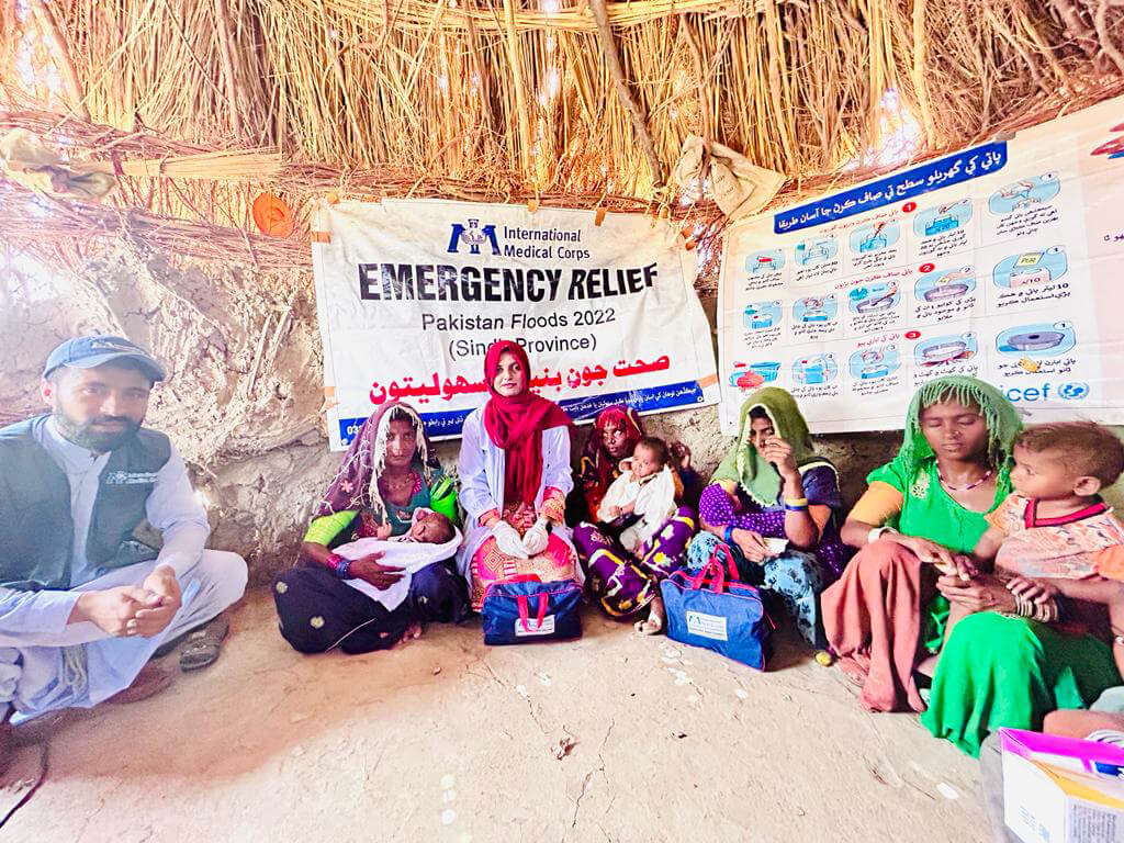 PAK_asd Dr. Nimra Sheikh (in the red scarf) with Sapa, Jonjhi Bai and other community members.