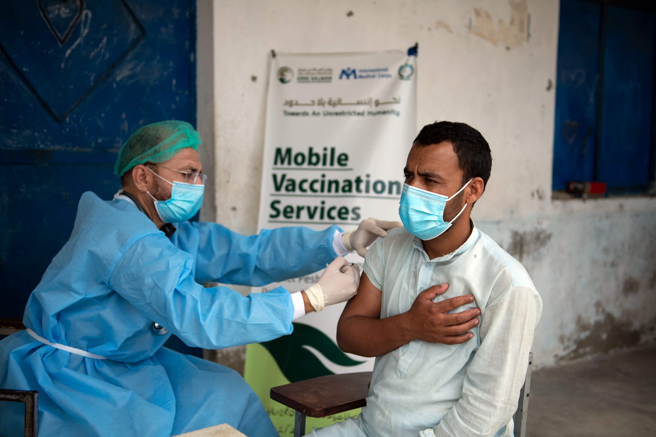 PAK_IMC_4374 A man receives a COVID-19 vaccination in Pakistan.