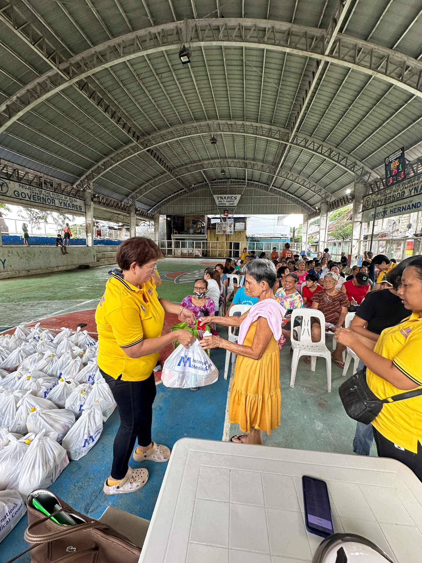 PHIL_IMG_5658 PABB staff members distribute food kits to communities affected by Typhoon Gaemi.