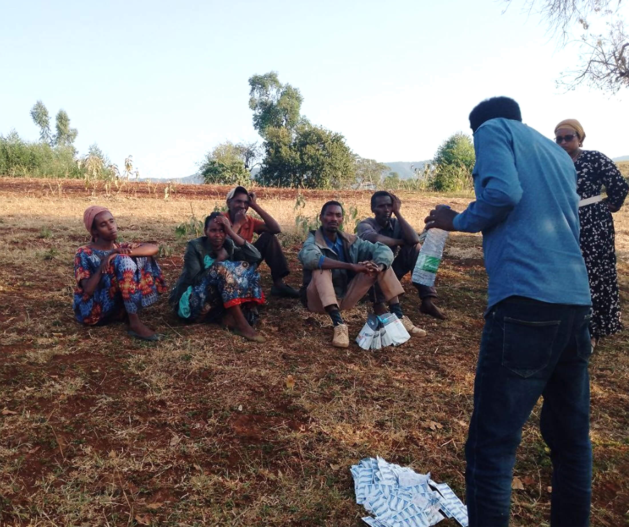 SNAP_Ethiopia-1 International Medical Corps staff members in Ethiopia run an awareness session on household water-treatment chemicals and distribute the chemicals to community households