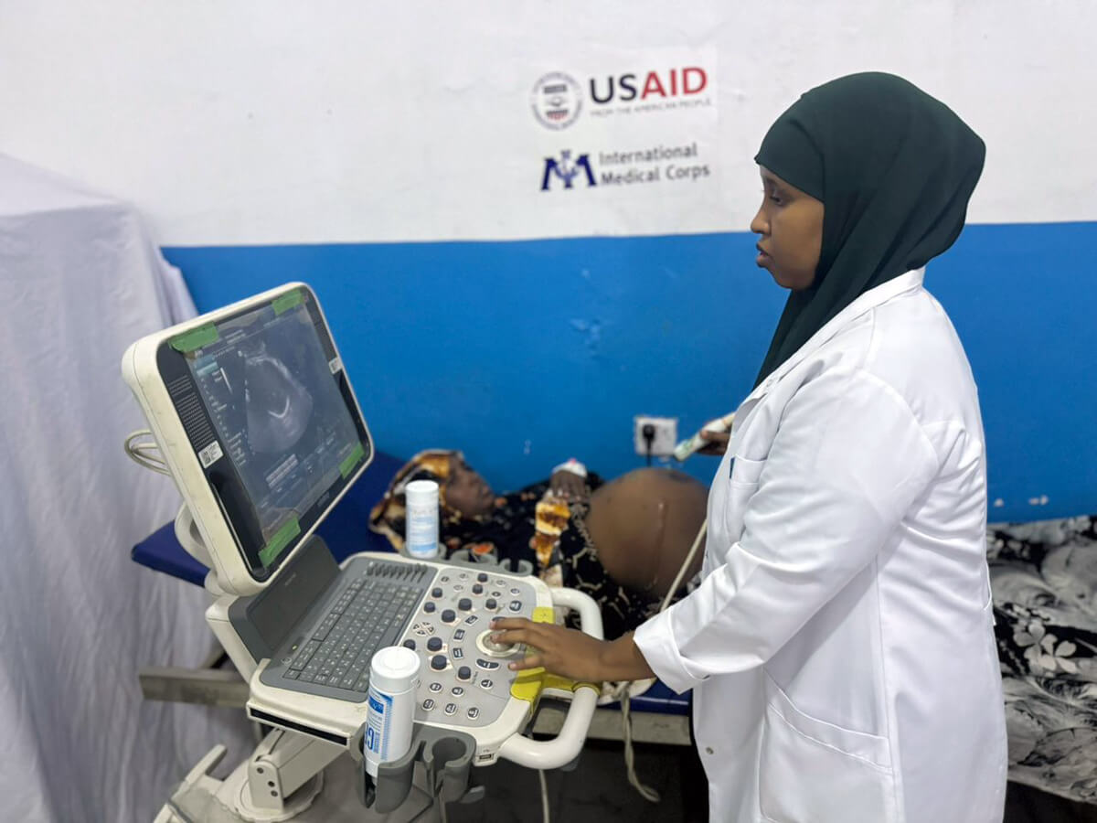 SOM_IMG-20240630-WA0084 Dr. Muna Ali performs an ultrasound on Fadumo.
