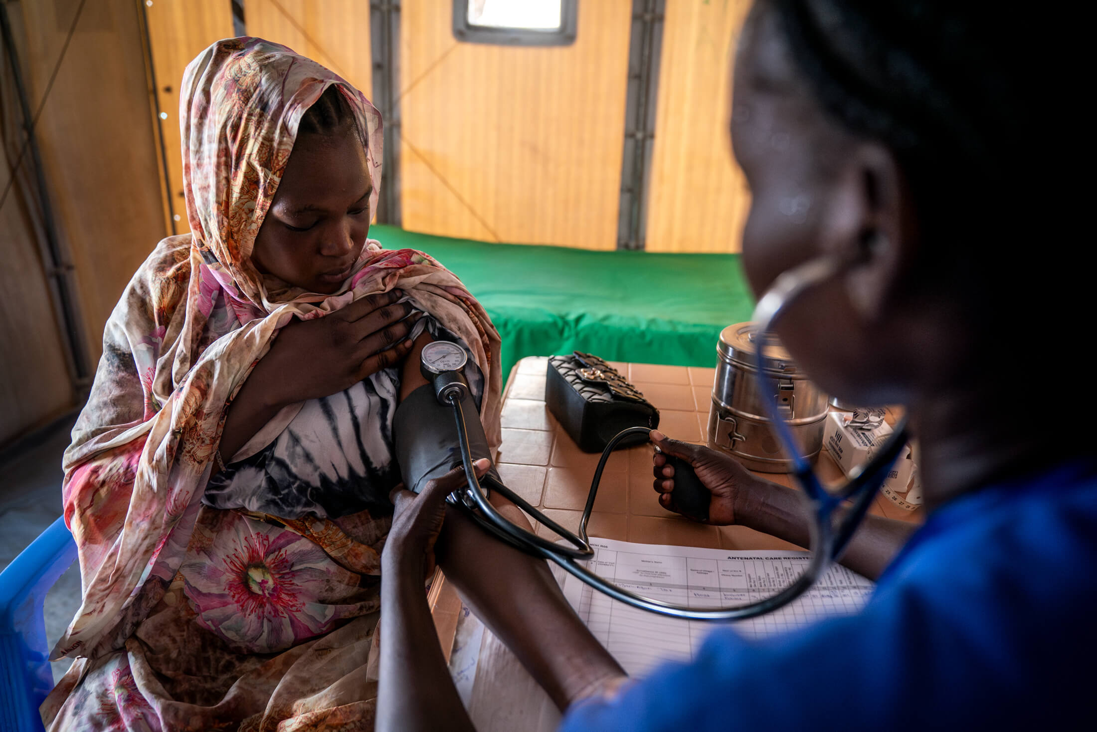 SOUTH-SUDAN_DZA_IMC-Renk_2024_03_14-DZA00296-Enhanced-NR A woman gets her blood pressure checked by our staff.