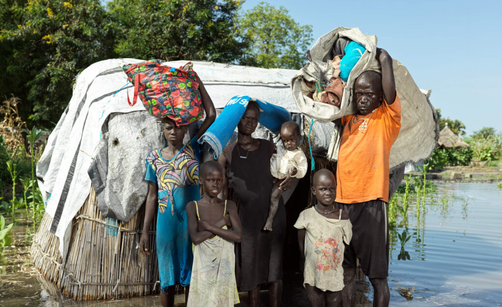 Nyaroum Nyang and his family saved their belongings hours before their home flooded in South Sudan.