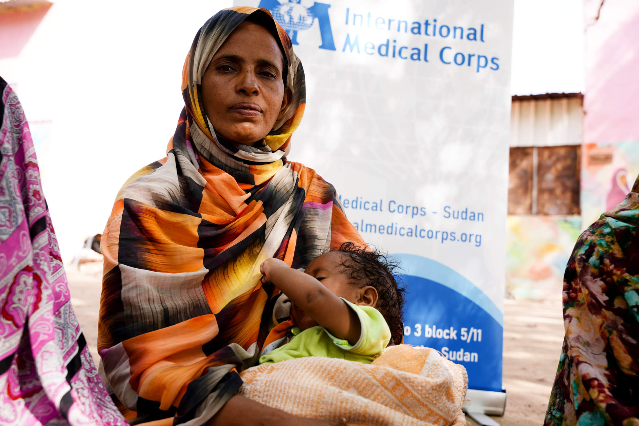 SUD_DSC05247 Abda Ismael holds her nine-month-old son, Mustafa.