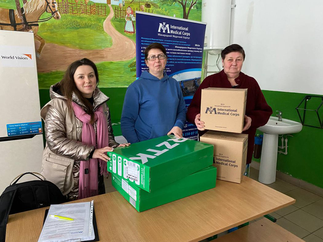 International Medical Corps team prepares hygiene kits for distribution at Zavadka Secondary School in Stryi.
