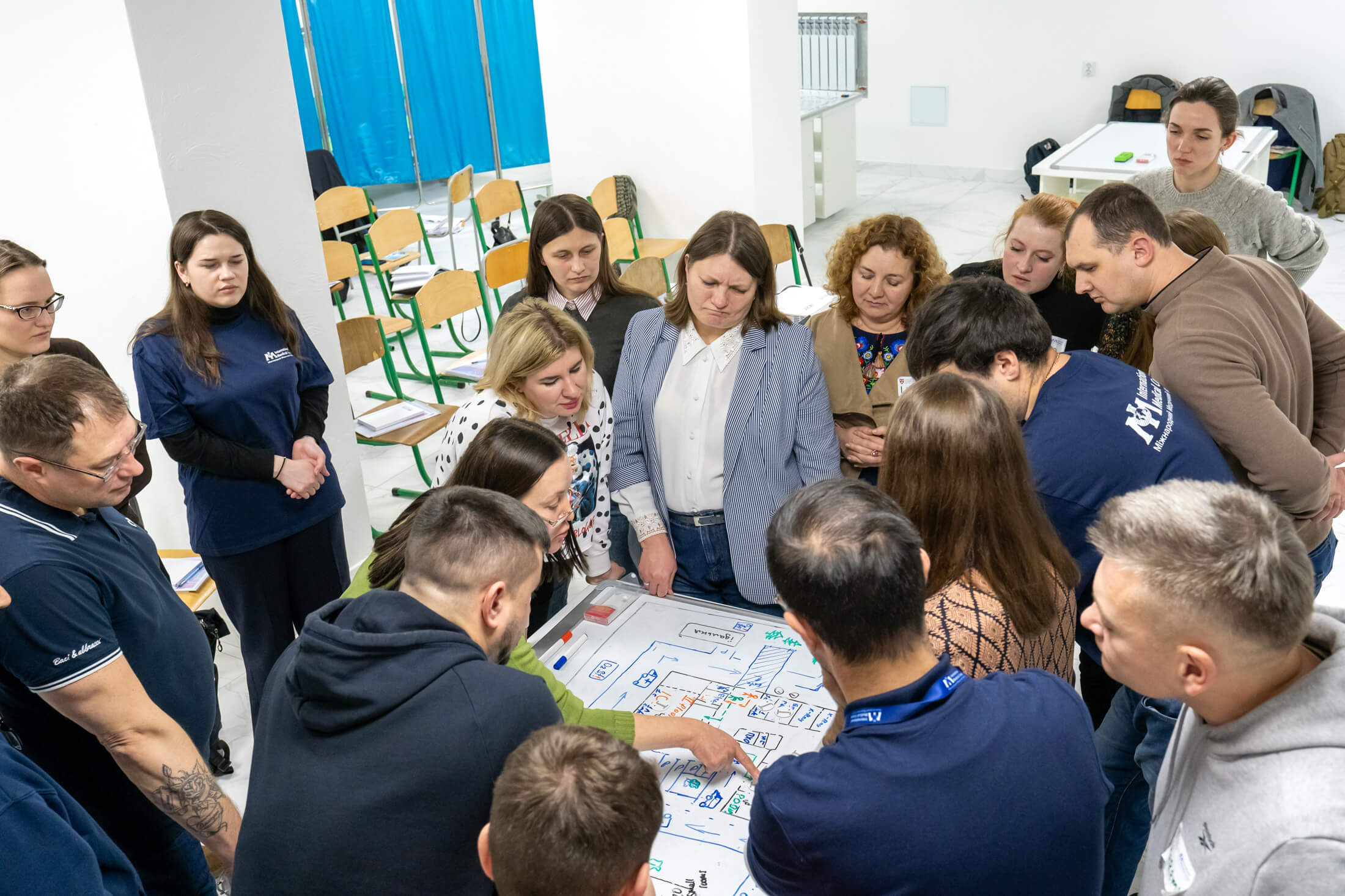 UKR_MIH01887 Ukrainian health workers discuss strategies for effective emergency responses.