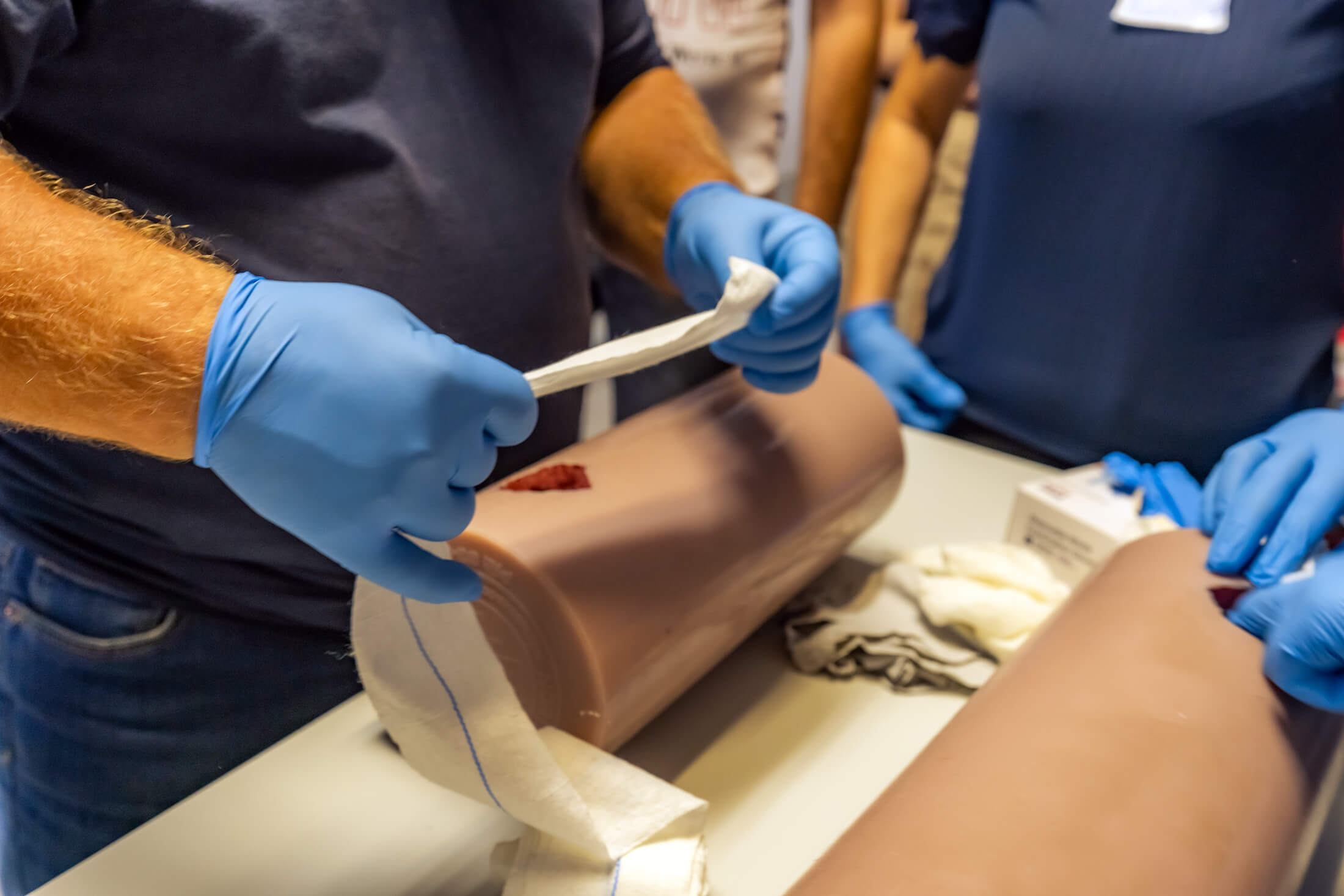 UKR_MIH07570 One aspect of the emergency- and trauma-care program is Stop The Bleed, a training course that shows participants how to control bleeding, encouraging them to practice techniques on mannequins.