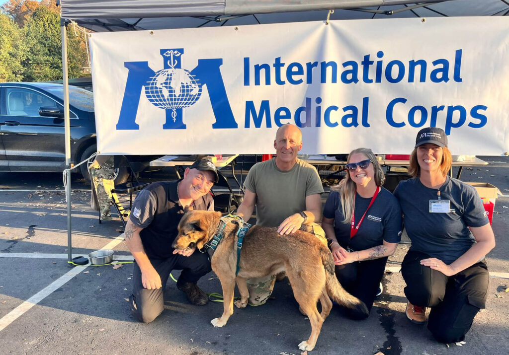 Clara is pictured with her owner, Steven (left) and Dr. Paul Sanford, Nurse Katie Purdy and Michelle Frias.