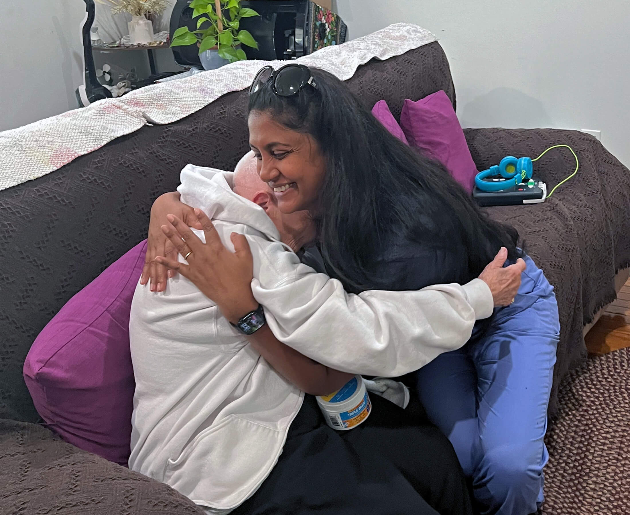 Shiv Kumarie hugs a patient after she was discharged from one of the Asheville shelters for people displaced by Helene. Shiv says, “This woman’s caregiver was generous and took her in. The roads to her house are still unpassable and it will be months before she can return to her own home.”