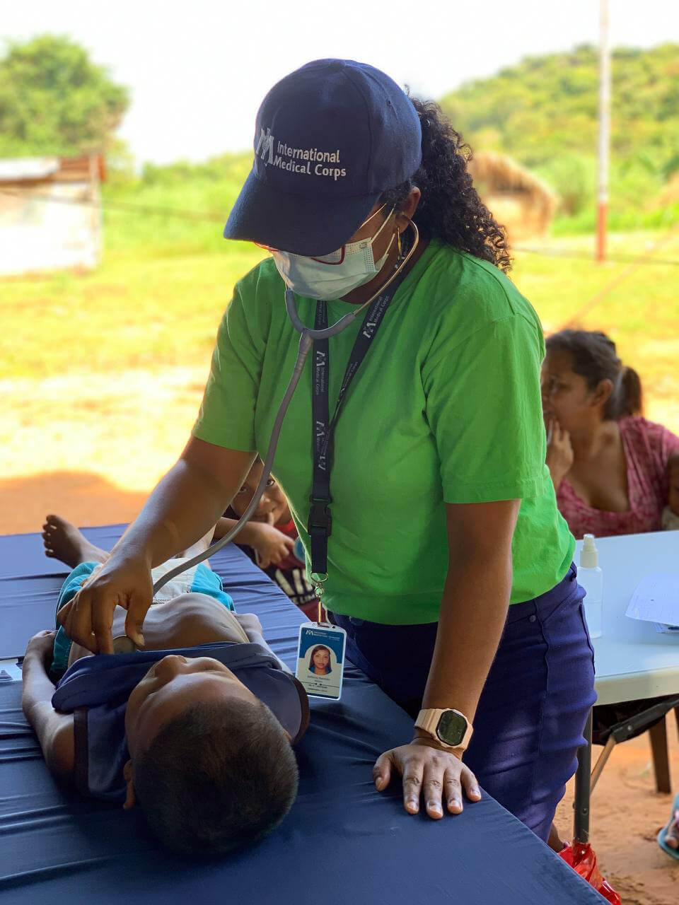 VEN_Figure-7.3 Children receive routine check-ups from our mobile team.