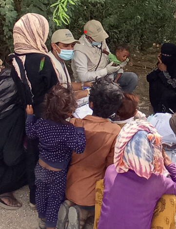 YEM_Screenshot-2022-07-05-102436 A member of our mobile team conducts a patient consultation in a rural area of Al-Mukha district.